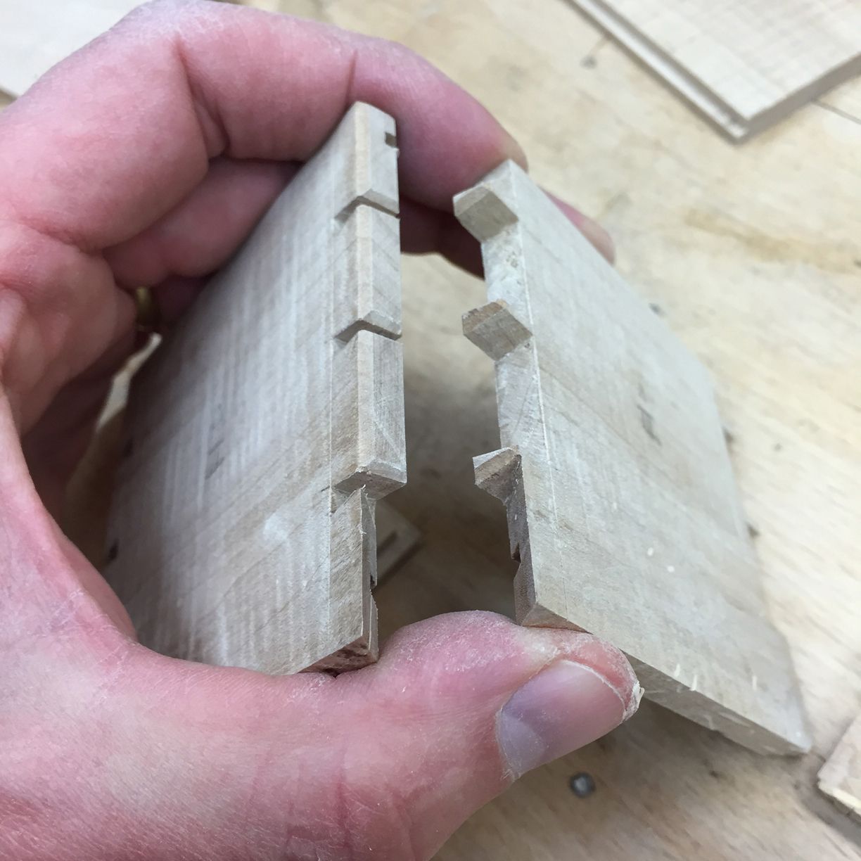 Detail of the mitered dovetail at the bottom.