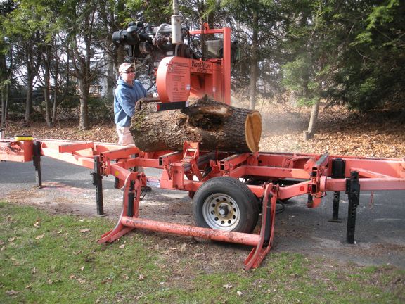 Portable mill sawing up a local Cherry tree - FineWoodworking