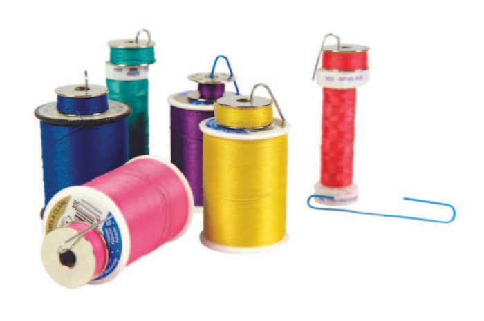 Spools of Thread, Bobbins with Threads of Different Colors and