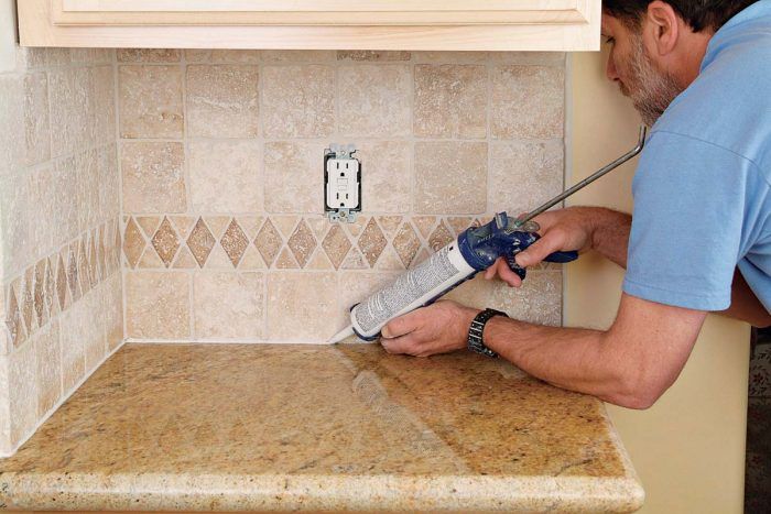 Remove silicone deals caulk from granite