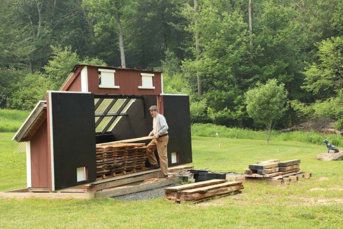 Drying wood in a solar kiln