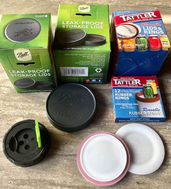 Ball and Tattler lids. The small lid, front left, is a shaker lid that fits a standard-size canning jar.