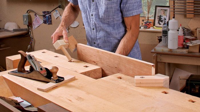 Use Dogs and a Bench Jack to Support Long Boards - FineWoodworking