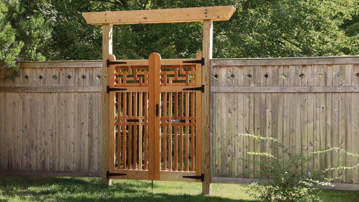 Gate with outlet wooden panels