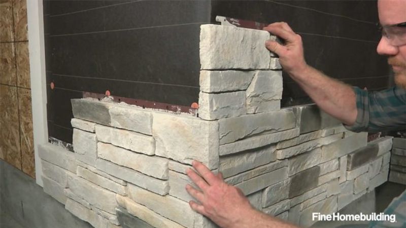 how-to-install-faux-stone-veneer-siding-panels-fine-homebuilding