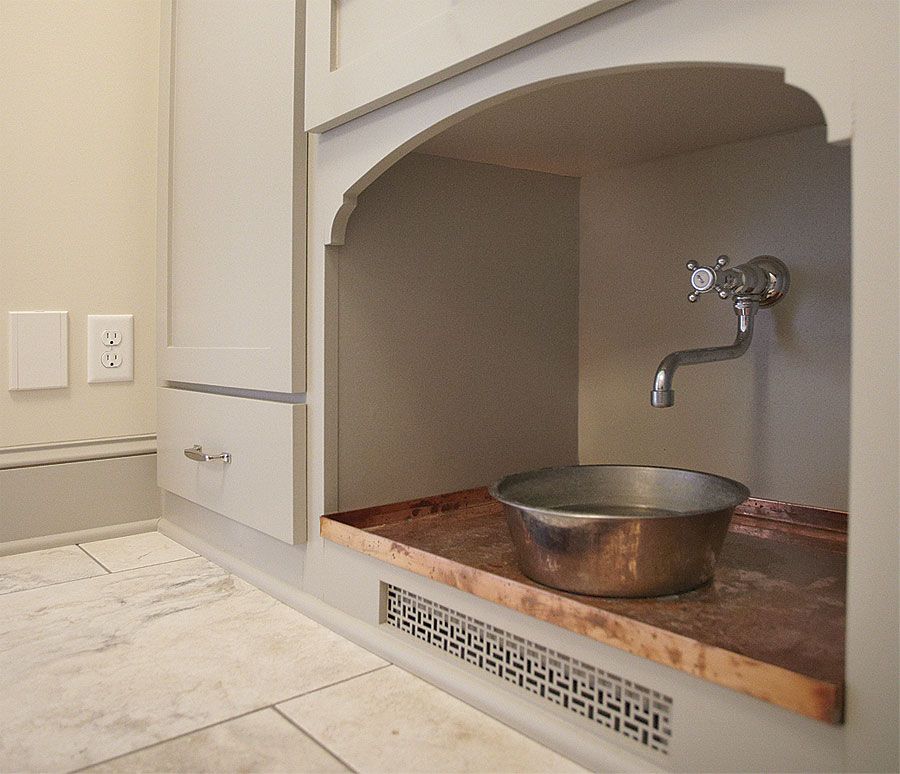 dog watering station in mudroom